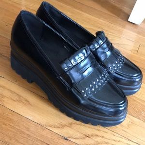 Black platform penny loafer shoes